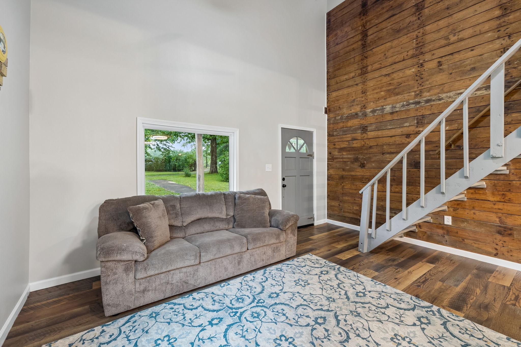 121 Hannah Road Summertown, TN 38483 - Photo 8 of 52 a living room with furniture and a rug