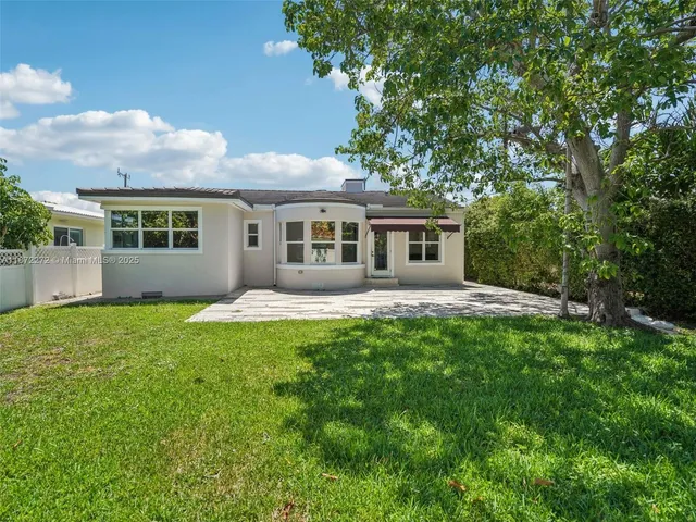 a house view with a garden space