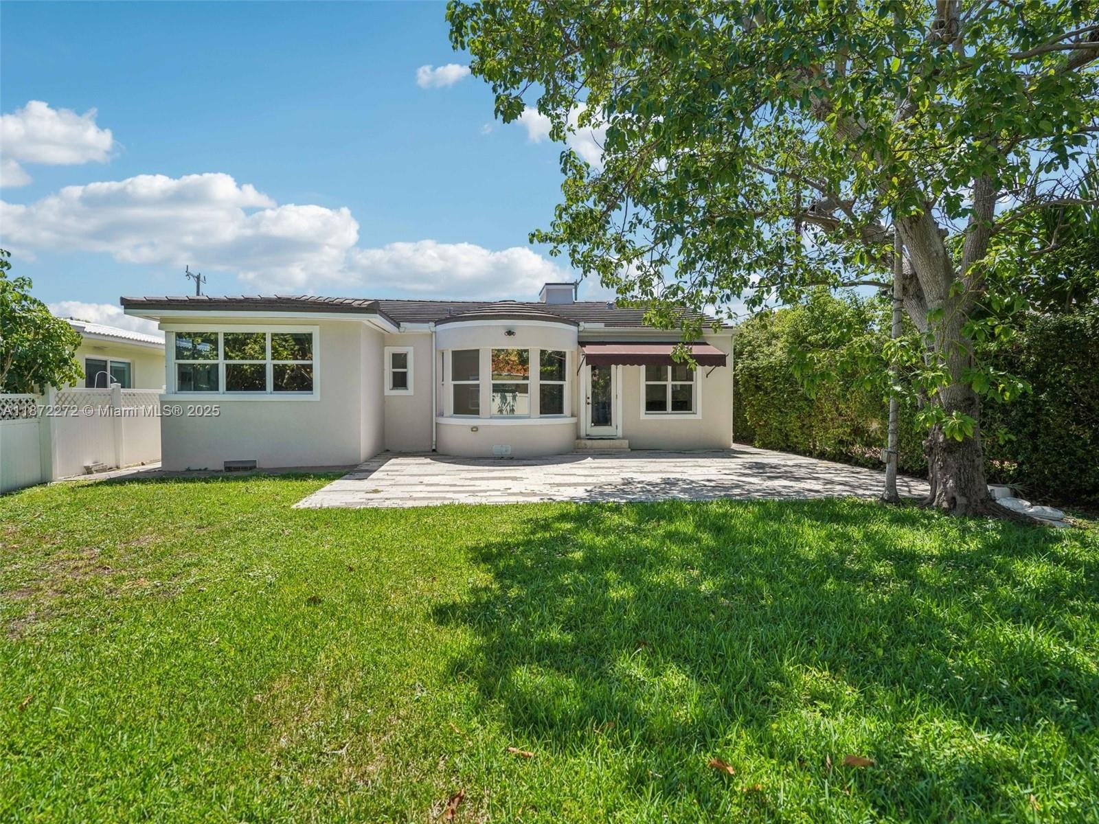 8875 Abbott Avenue Surfside, FL 33154 - Photo 28 of 45 a house view with a garden space