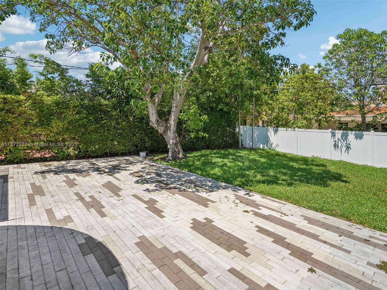 8875 Abbott Avenue Surfside, FL 33154 - Photo 32 of 45 a view of a backyard