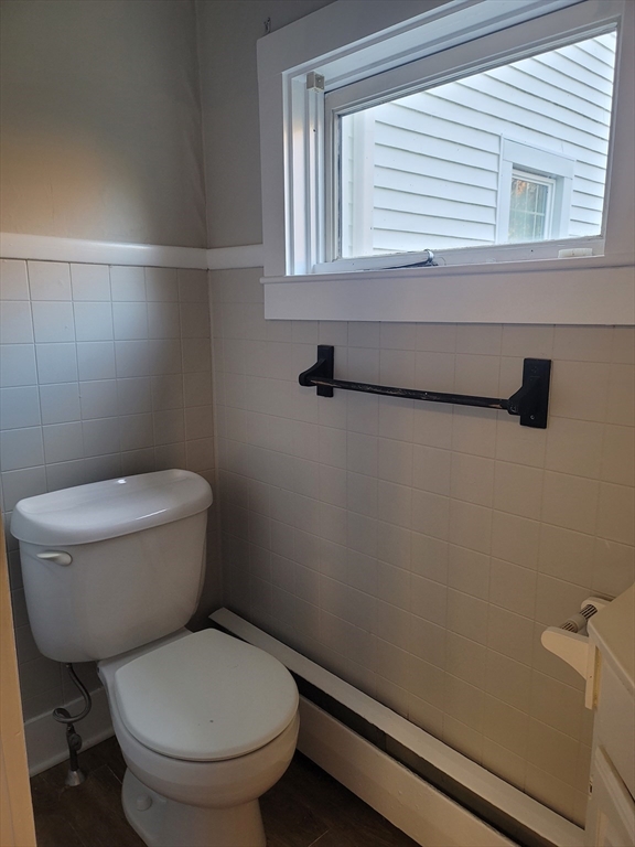 45 Main Street, Unit I Charlton, MA 01507 - Photo 5 of 11 a bathroom with a toilet and a window