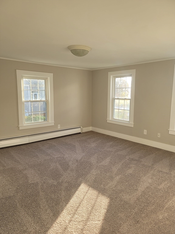 45 Main Street, Unit I Charlton, MA 01507 - Photo 6 of 11 an empty room with windows