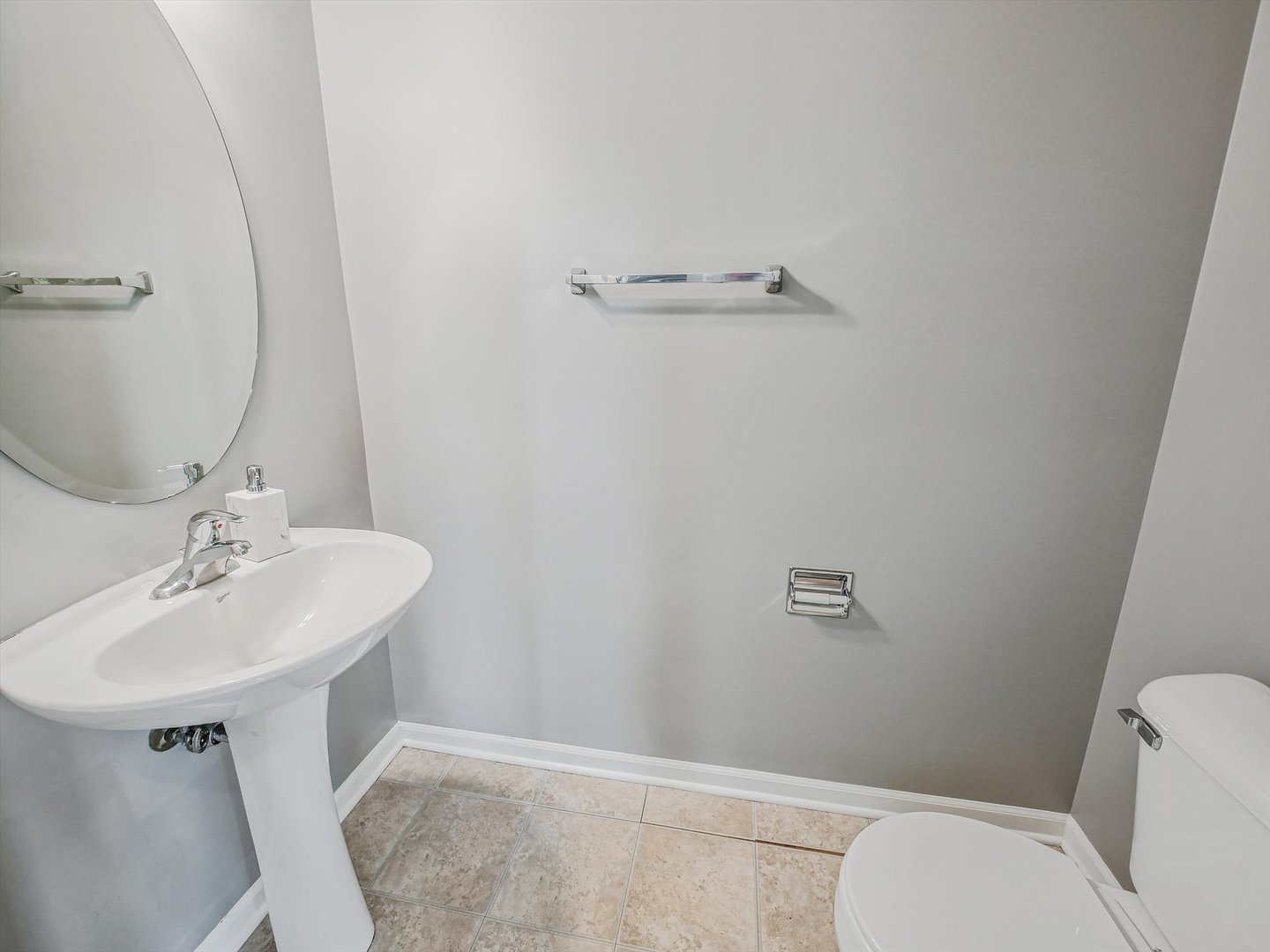 1090 Maubert Court Carol Stream, IL 60188 - Photo 20 of 55 a bathroom with a sink a toilet and mirror