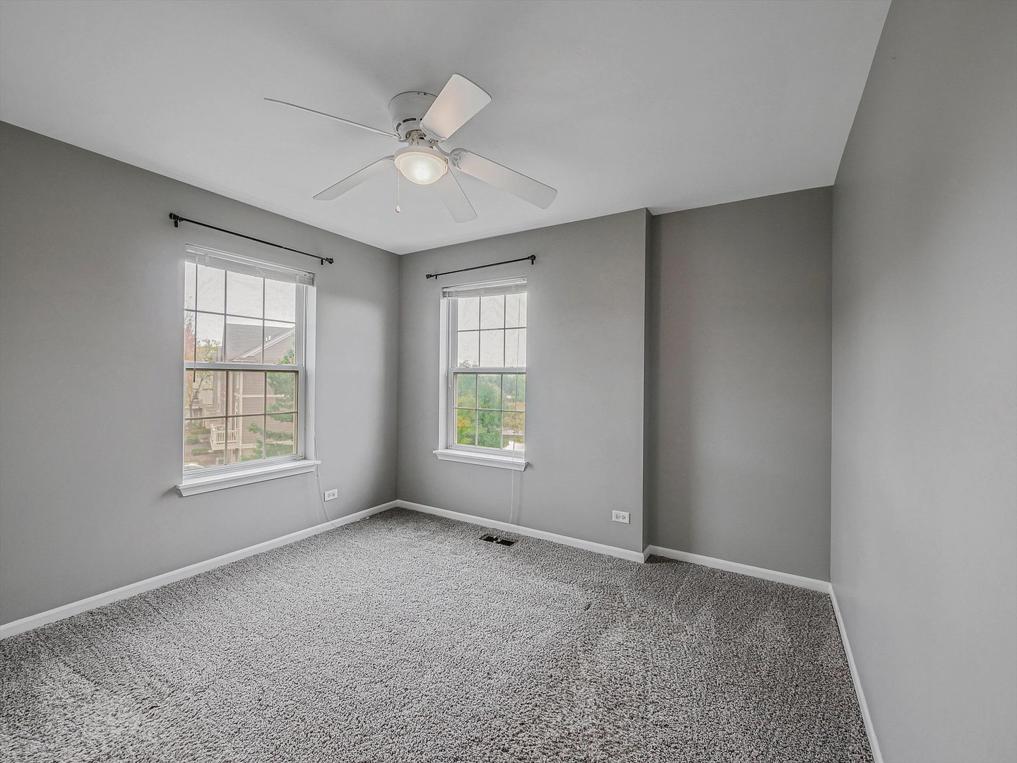 1090 Maubert Court Carol Stream, IL 60188 - Photo 24 of 55 a view of an empty room with a window