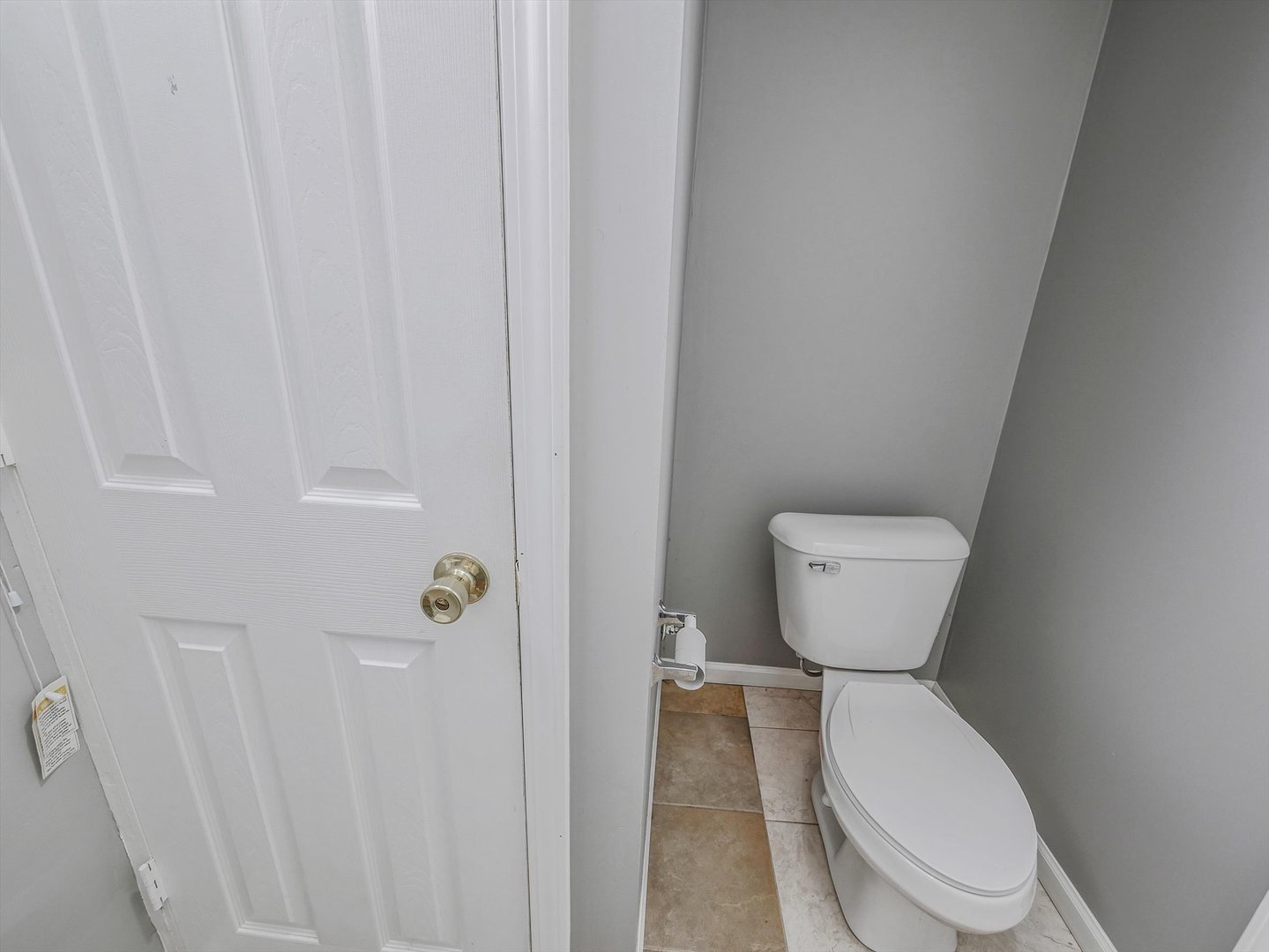 1090 Maubert Court Carol Stream, IL 60188 - Photo 39 of 55 a white toilet sitting next to a shower
