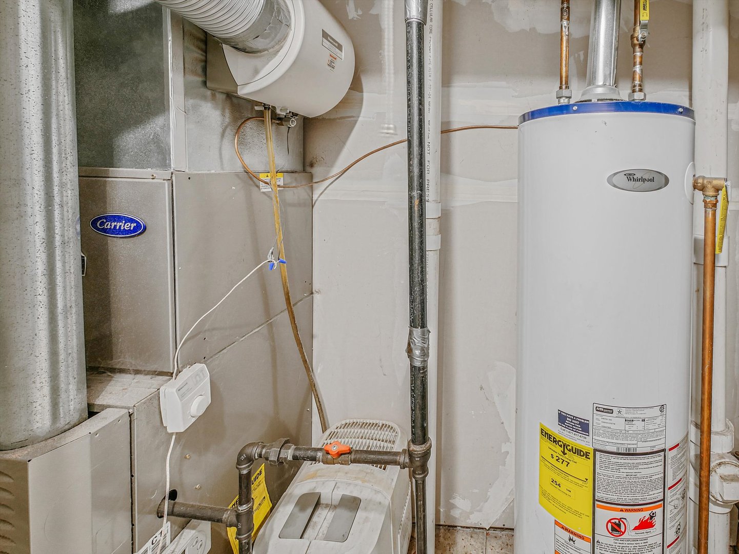 1090 Maubert Court Carol Stream, IL 60188 - Photo 40 of 55 a bathroom with a sink and mirror