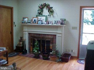 625 South Spruce Street Lititz, PA 17543 - Photo 4 of 7 a living room with furniture and a fireplace