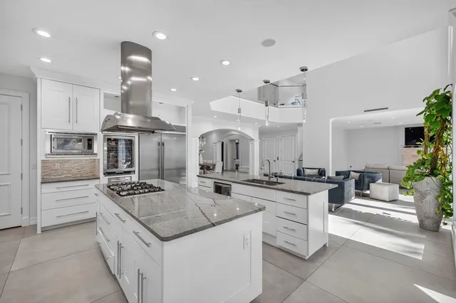a view of a dining room with furniture and window