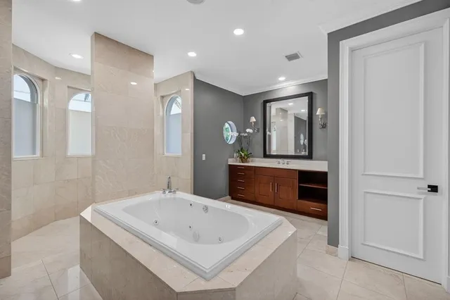 a view of swimming pool with outdoor seating and city view