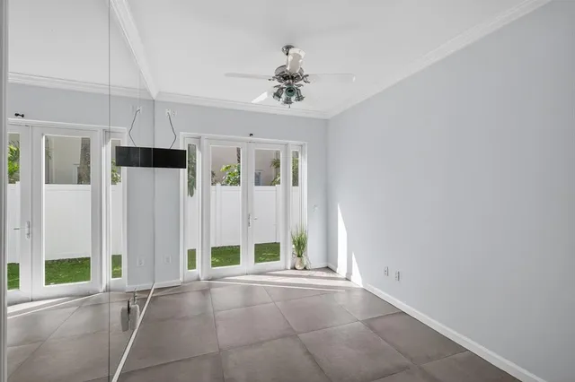 a view of a house with pool and sitting area
