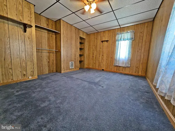 a view of empty room with a window