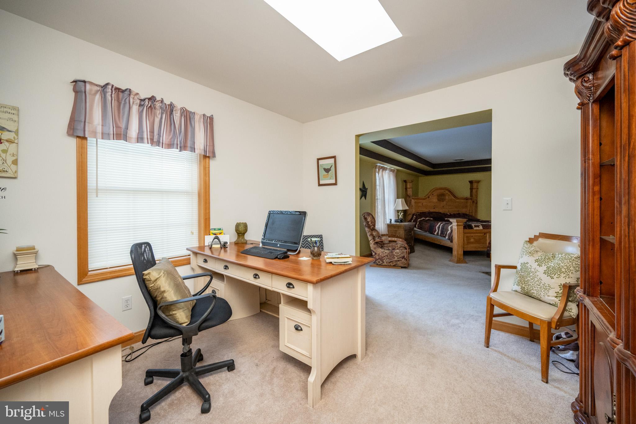 3836 Chestnut Grove Road Swanton, MD 21561 - Photo 77 of 111 a view of a workspace with furniture and a window