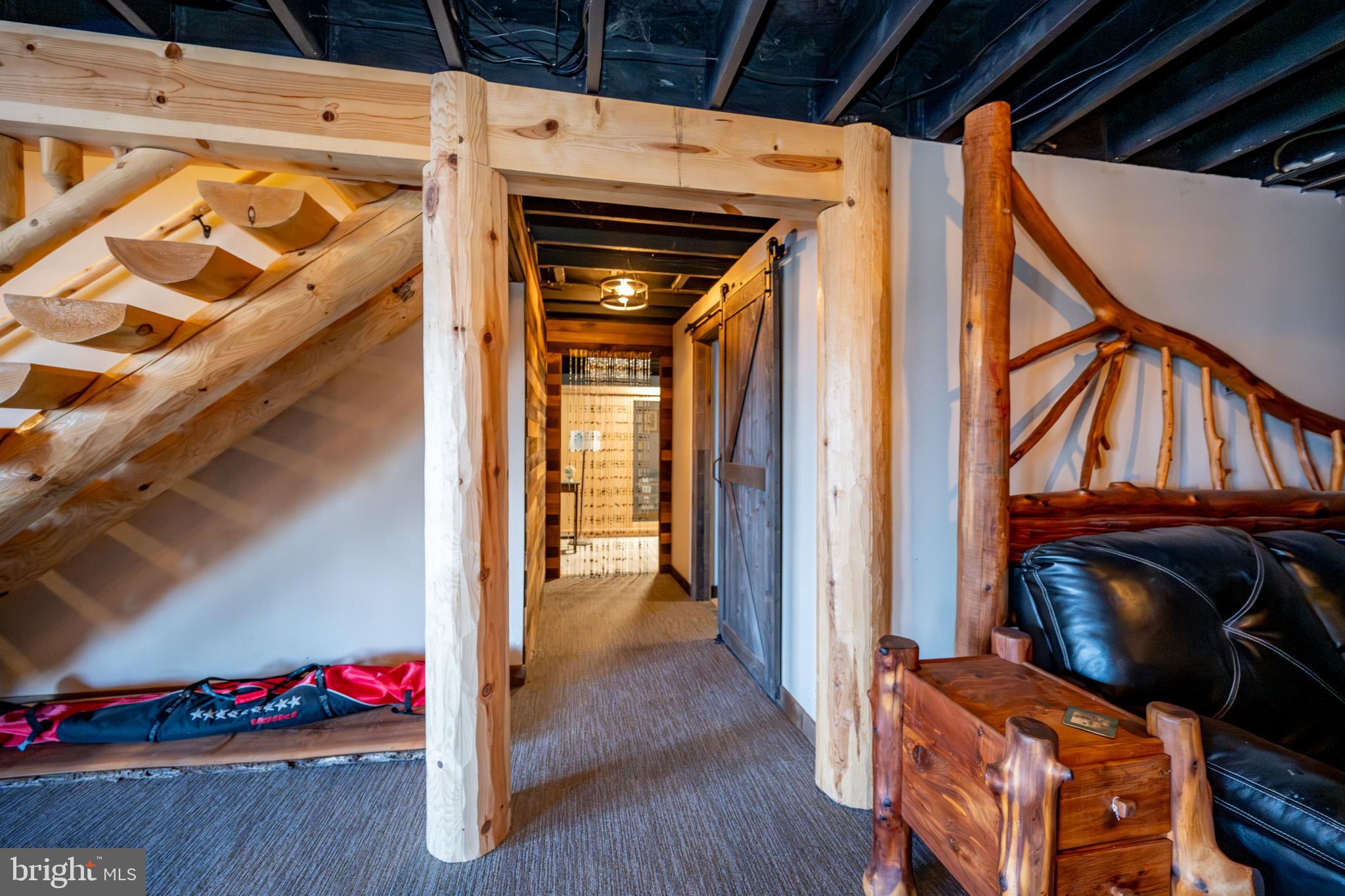 3836 Chestnut Grove Road Swanton, MD 21561 - Photo 92 of 111 a view of walk in closet with clothes and shoes