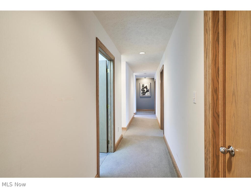 875 Hunter Ridge Circle Fairlawn, OH 44333 - Photo 16 of 34 Hall to bedrooms