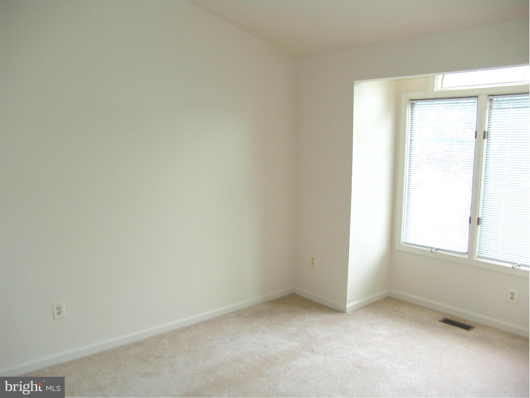5223 Columbia Road, Unit 763 Columbia, MD 21044 - Photo 12 of 18 an empty room with a window