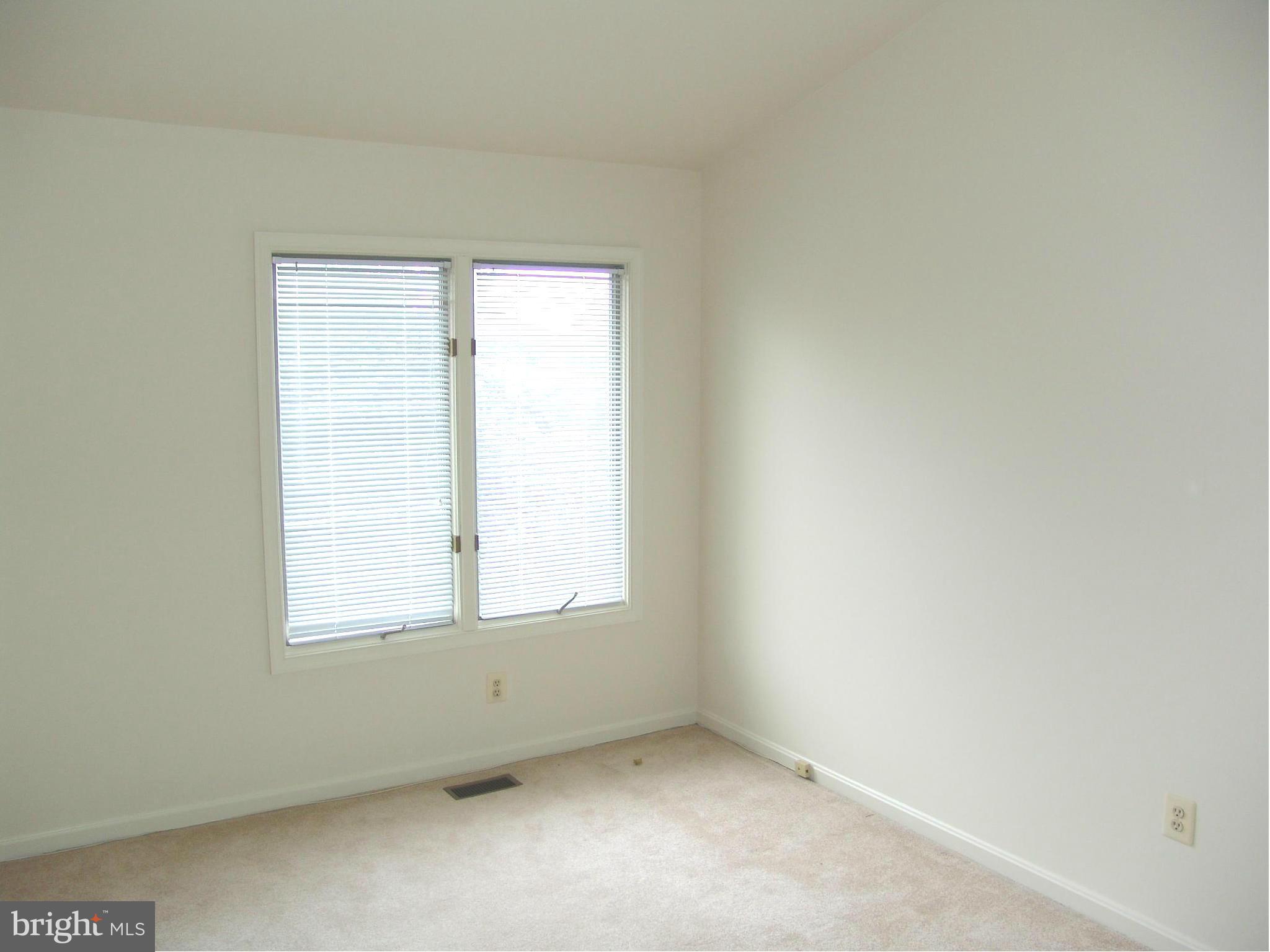 5223 Columbia Road, Unit 763 Columbia, MD 21044 - Photo 13 of 18 an empty room with a window