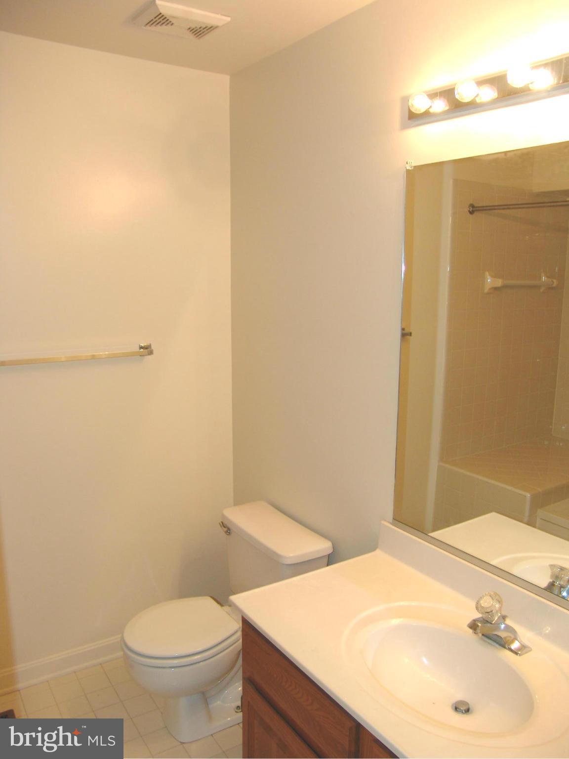 5223 Columbia Road, Unit 763 Columbia, MD 21044 - Photo 14 of 18 a bathroom with a sink and a toilet
