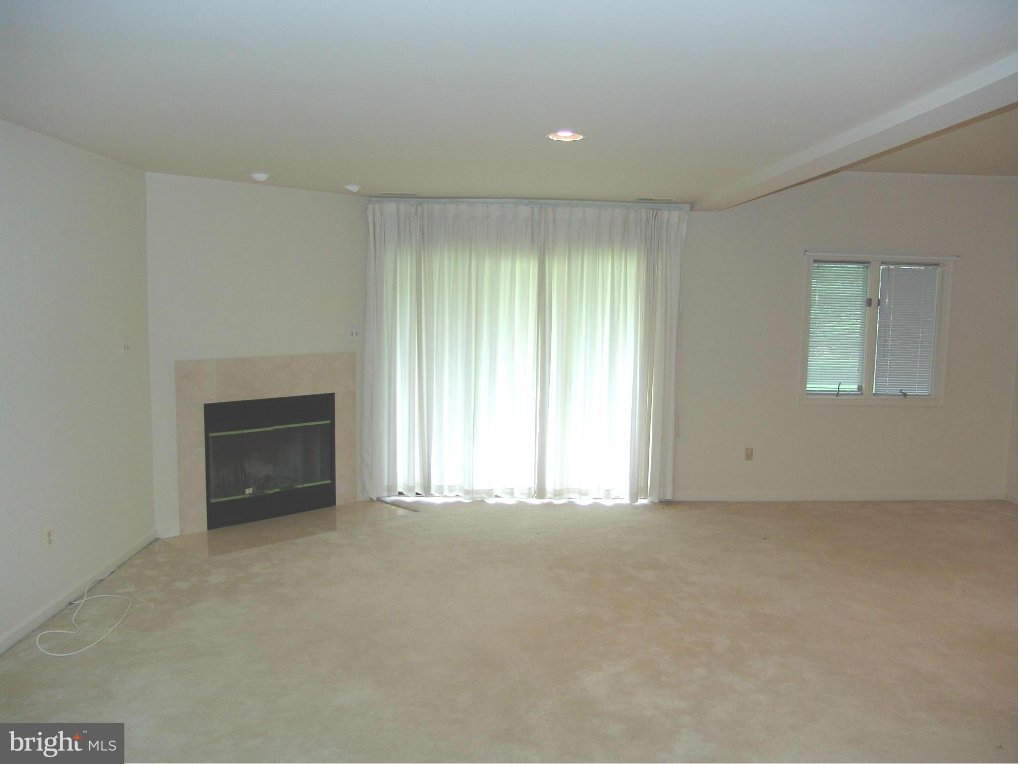 5223 Columbia Road, Unit 763 Columbia, MD 21044 - Photo 17 of 18 a view of an empty room with a window
