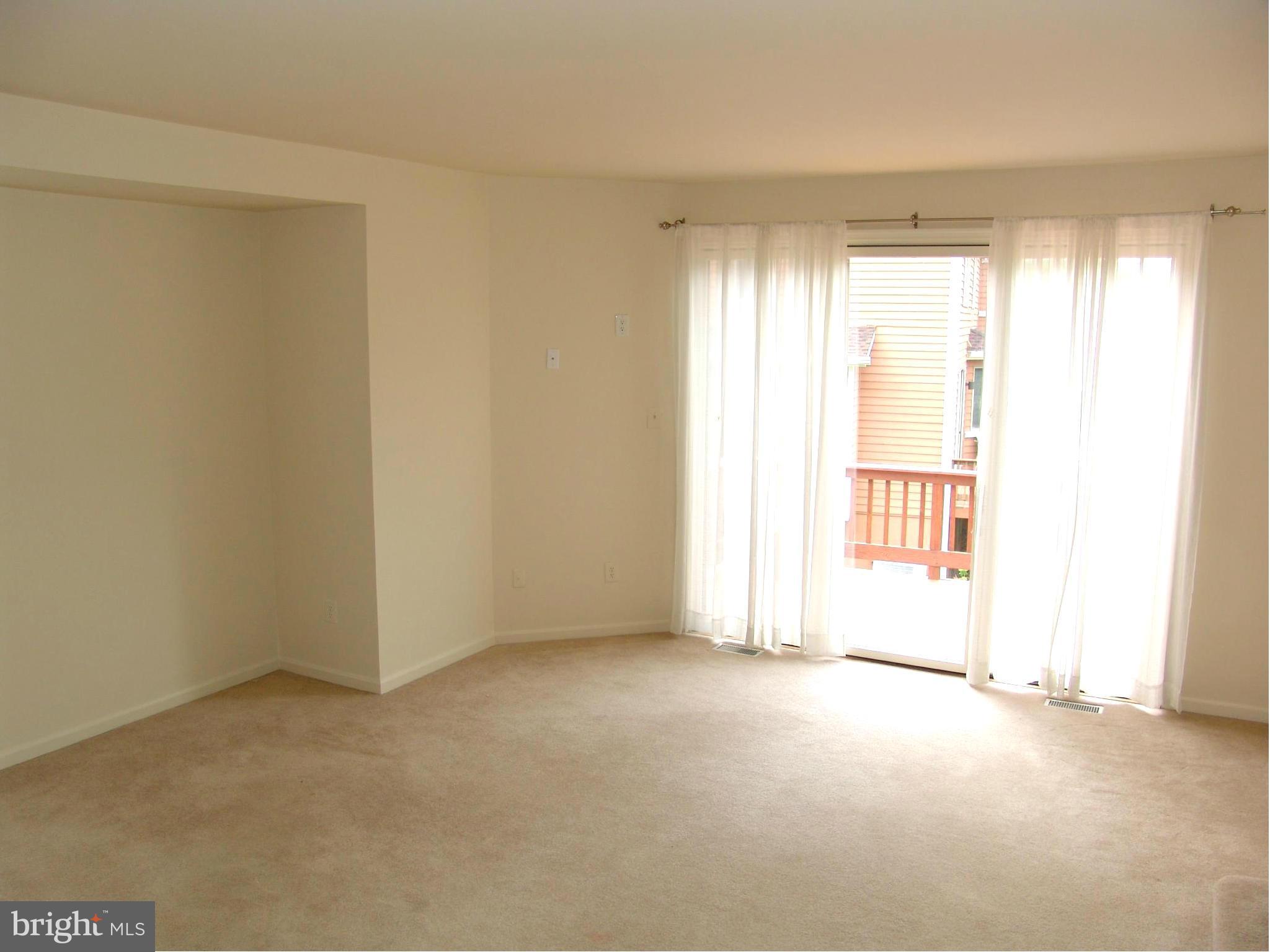 5223 Columbia Road, Unit 763 Columbia, MD 21044 - Photo 5 of 18 an empty room with a window