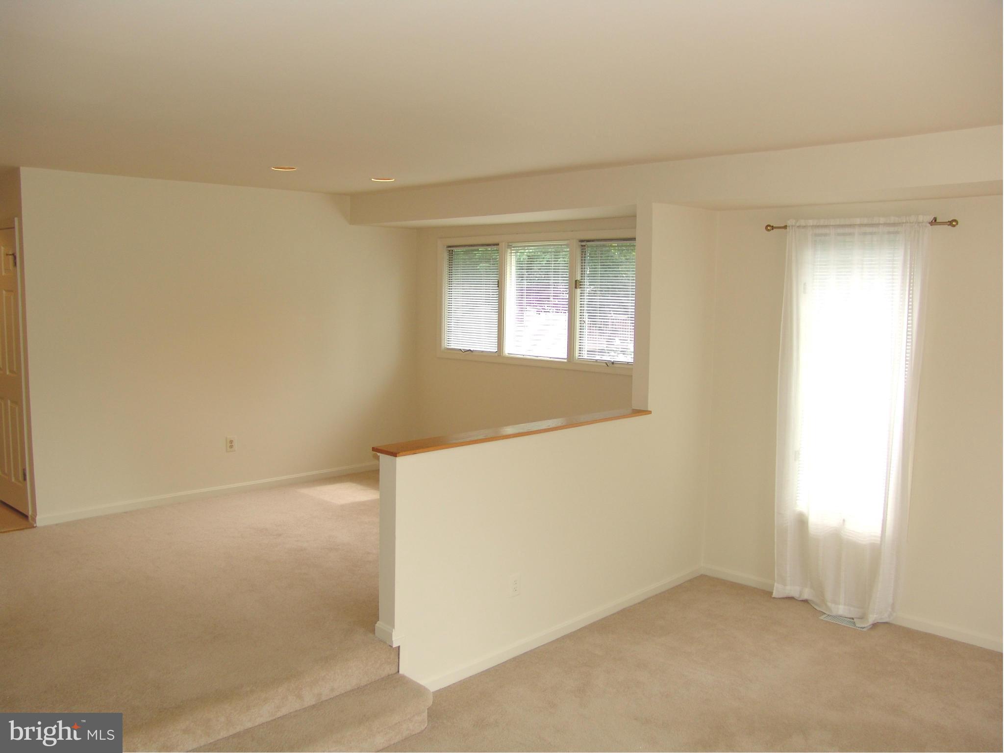 5223 Columbia Road, Unit 763 Columbia, MD 21044 - Photo 6 of 18 an empty room with windows