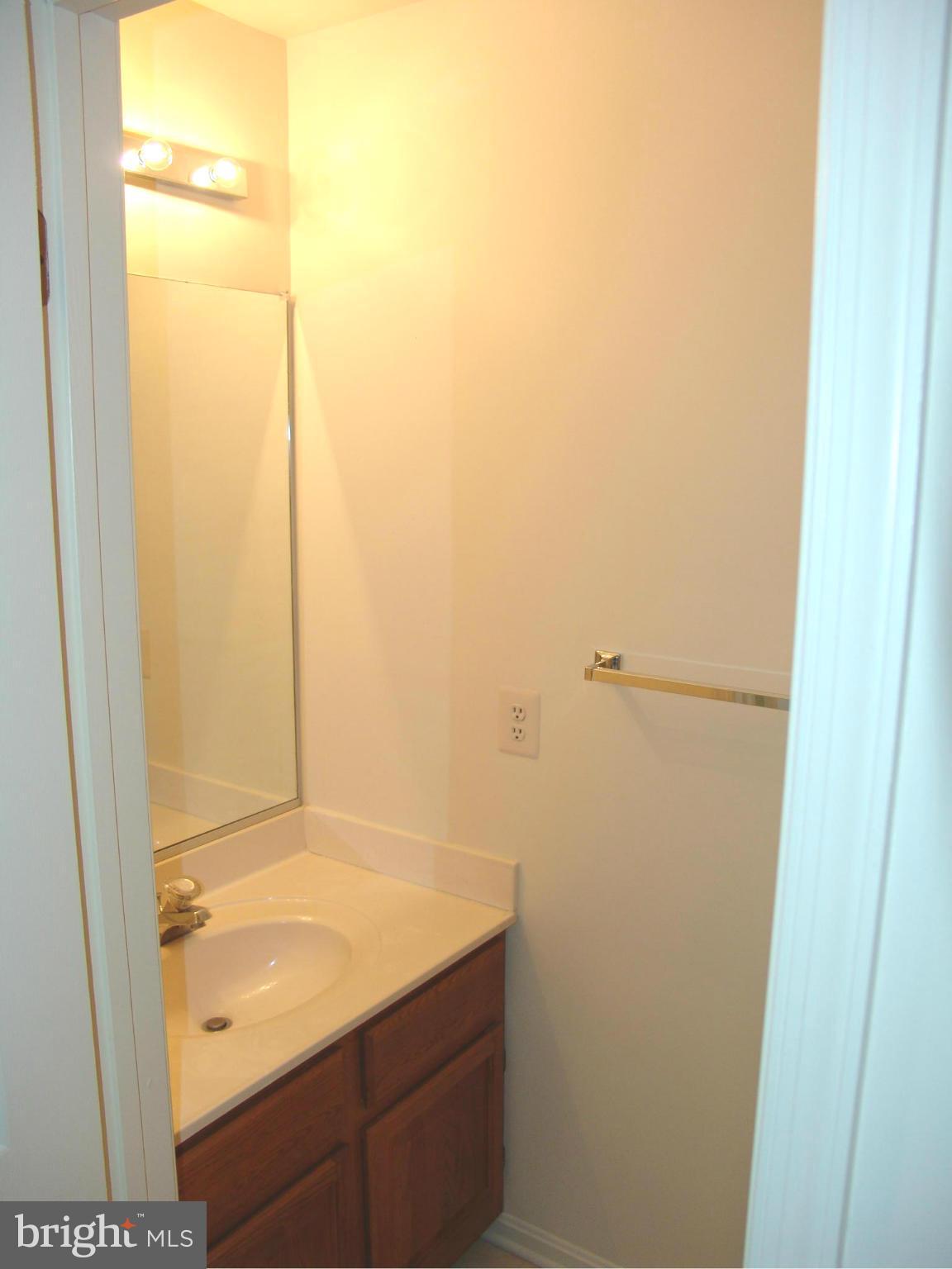 5223 Columbia Road, Unit 763 Columbia, MD 21044 - Photo 8 of 18 a bathroom with a shower and a sink