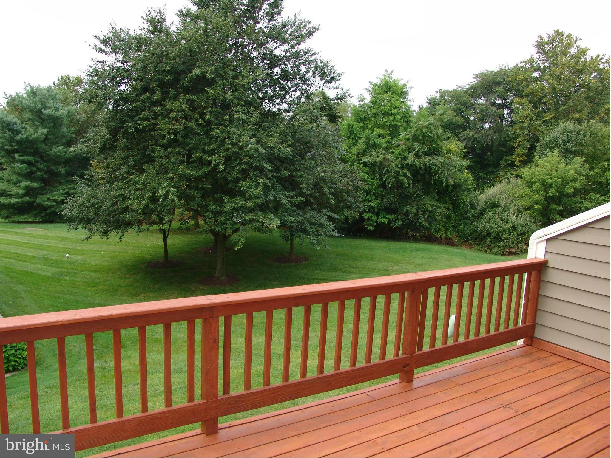 5223 Columbia Road, Unit 763 Columbia, MD 21044 - Photo 9 of 18 a view of balcony with deck and yard