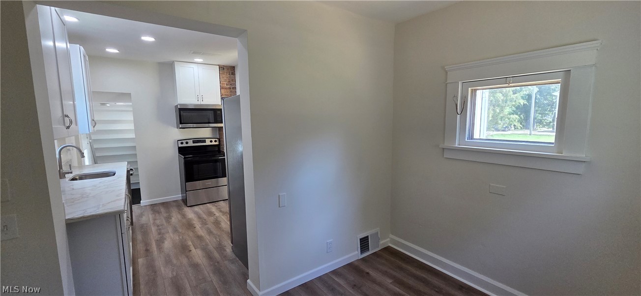 9964 East River Road Elyria, OH 44035 - Photo 19 of 45 From the flex room looking into the kitchen.