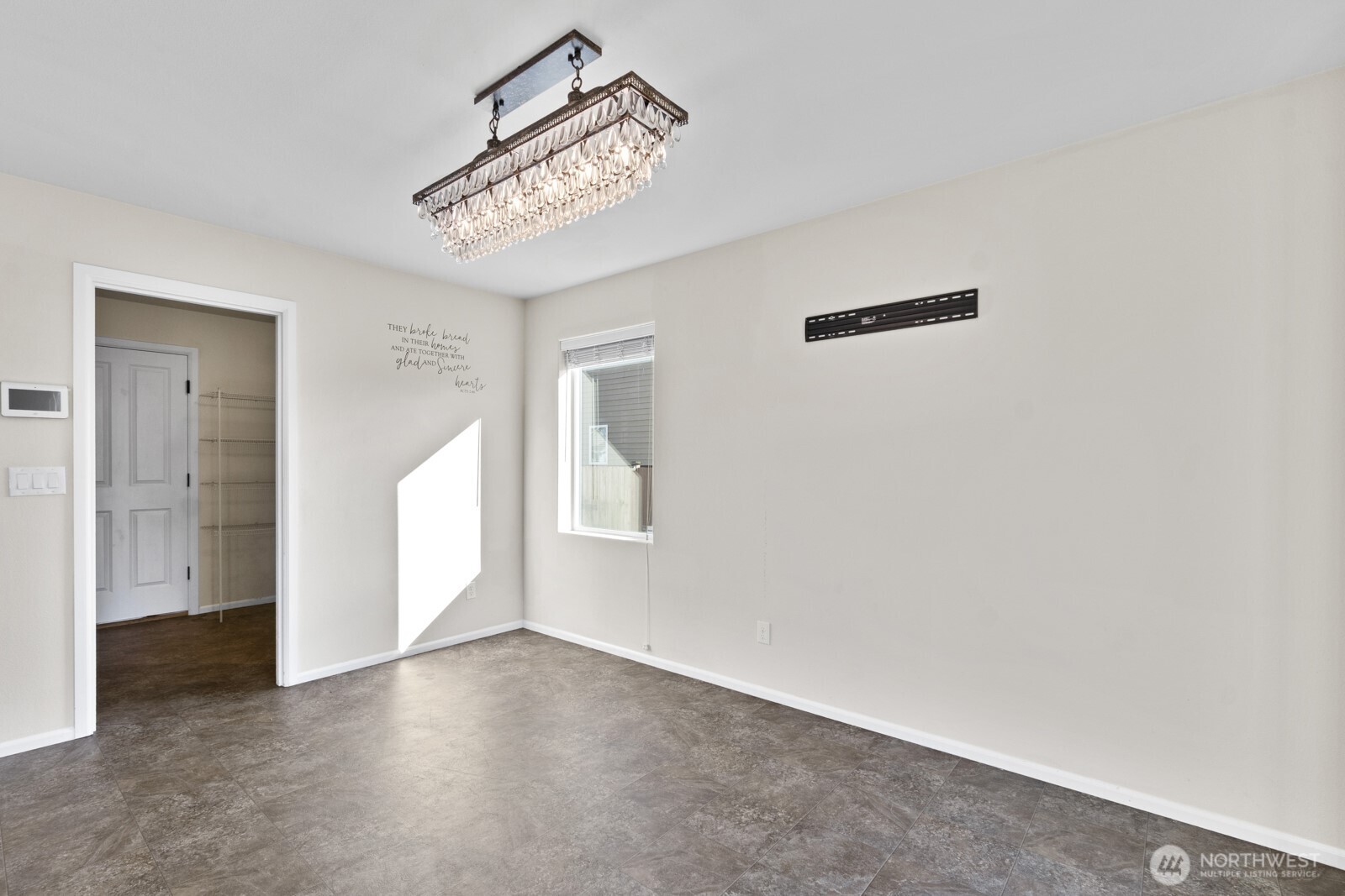 1105 Sigafoos Avenue Northwest Orting, WA 98360 - Photo 14 of 40 a view of empty room with windows