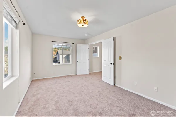 an empty room that has a window