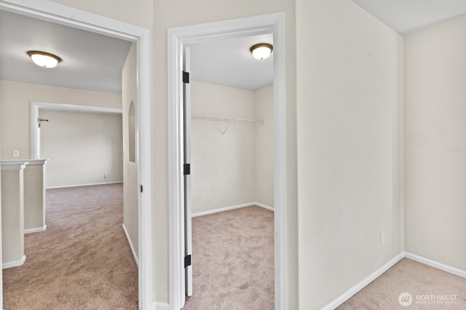 1105 Sigafoos Avenue Northwest Orting, WA 98360 - Photo 23 of 40 a view of a bathroom with a glass door and shower