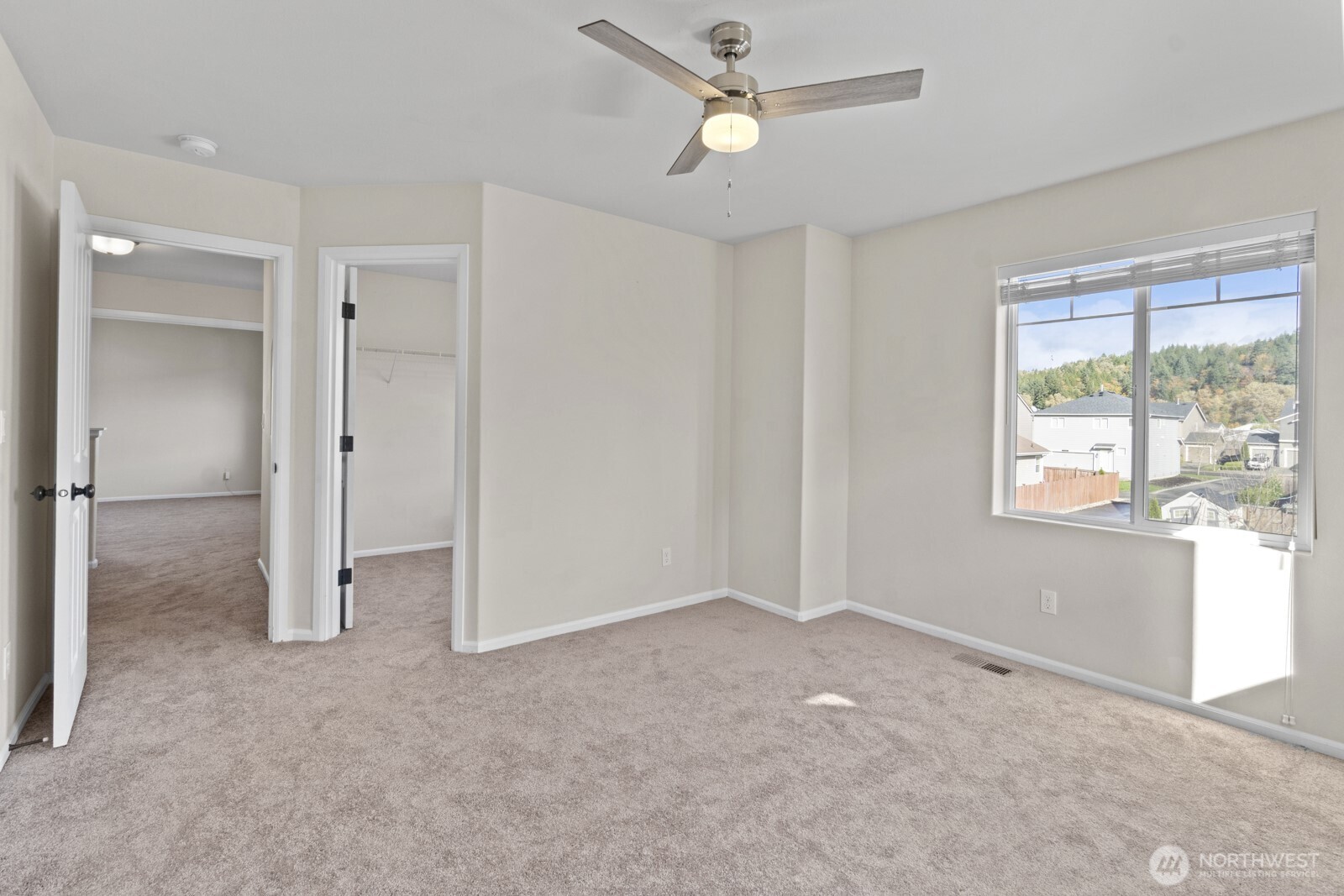 1105 Sigafoos Avenue Northwest Orting, WA 98360 - Photo 25 of 40 a view of an empty room with a window