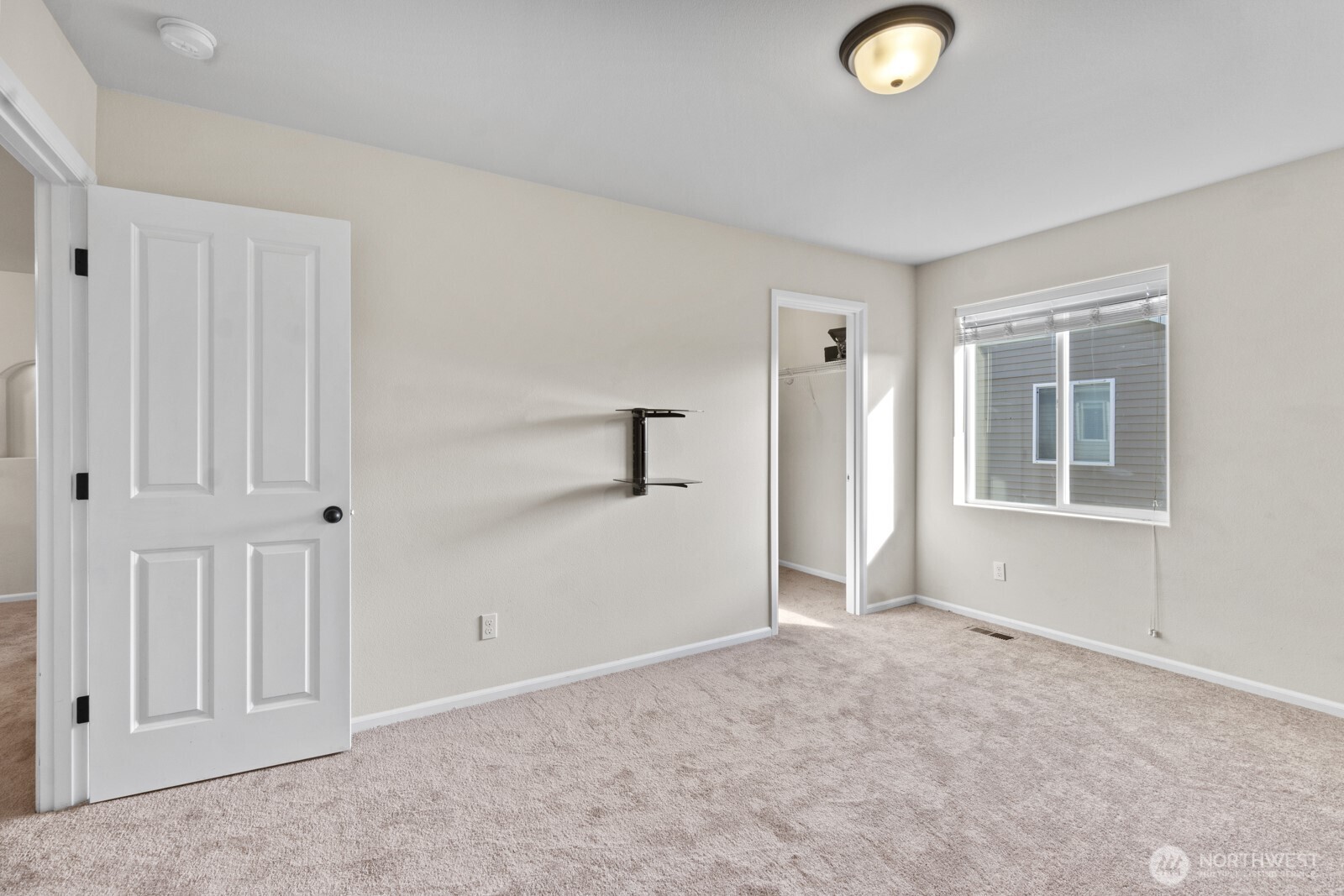 1105 Sigafoos Avenue Northwest Orting, WA 98360 - Photo 26 of 40 a view of an empty room with window