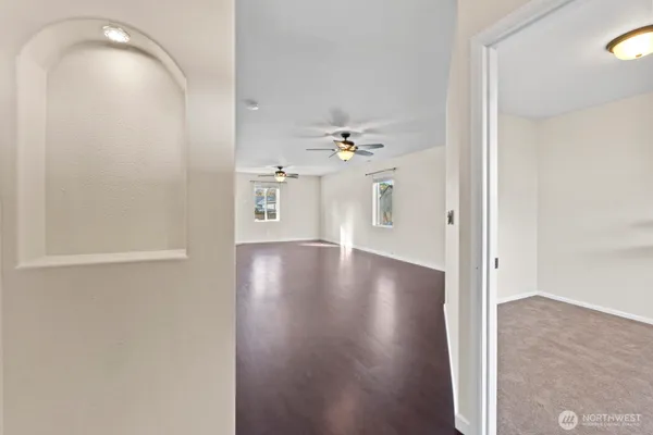 a view of a livingroom with wooden floor