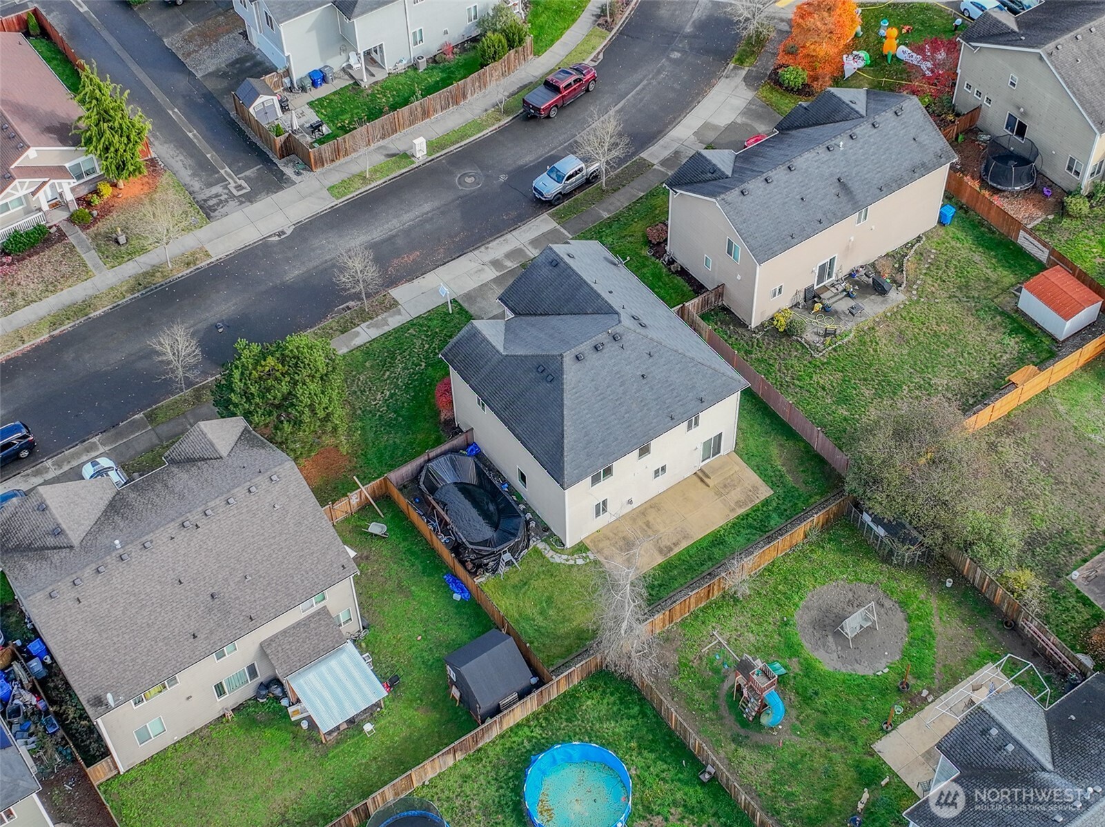 1105 Sigafoos Avenue Northwest Orting, WA 98360 - Photo 35 of 40 an aerial view of a house with a garden