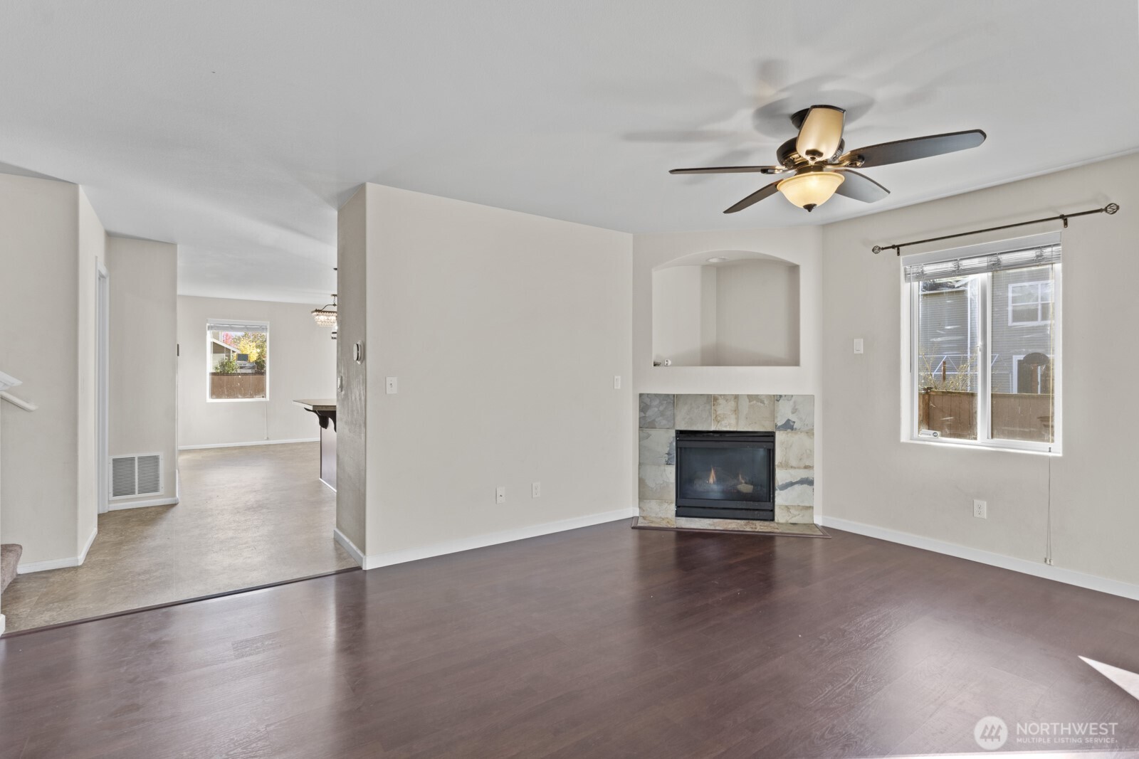 1105 Sigafoos Avenue Northwest Orting, WA 98360 - Photo 8 of 40 a view of a livingroom with a fireplace and window