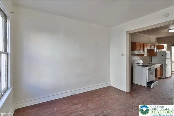 a view of a kitchen with a sink