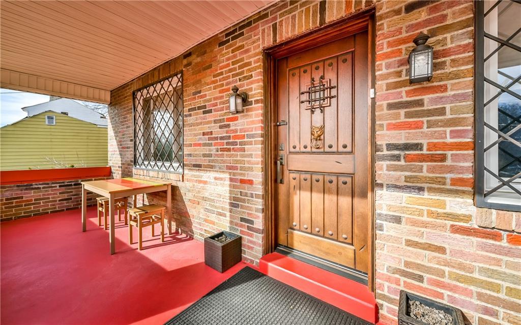 Massive wood entry door welcomes you inside. 