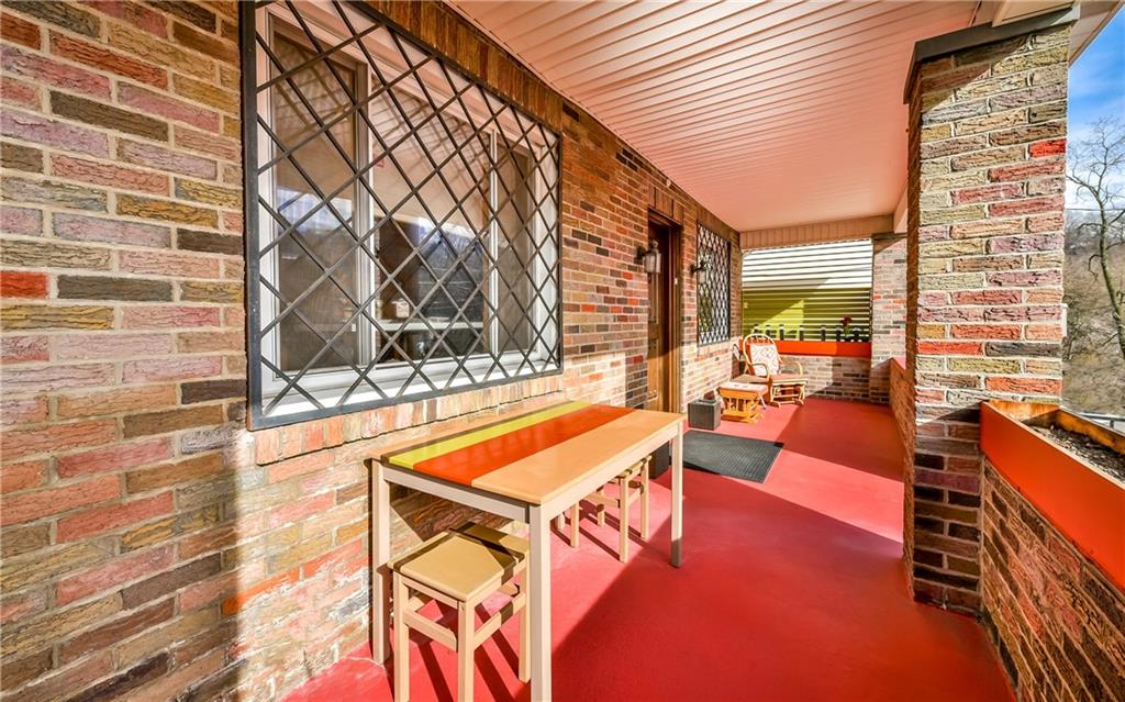 Spend your sunny days on this front porch