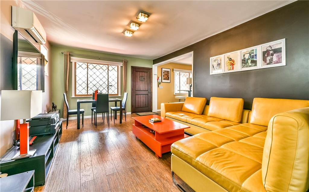Cased in luxury 30-year warranty laminate flooring perfect for high traffic area. 