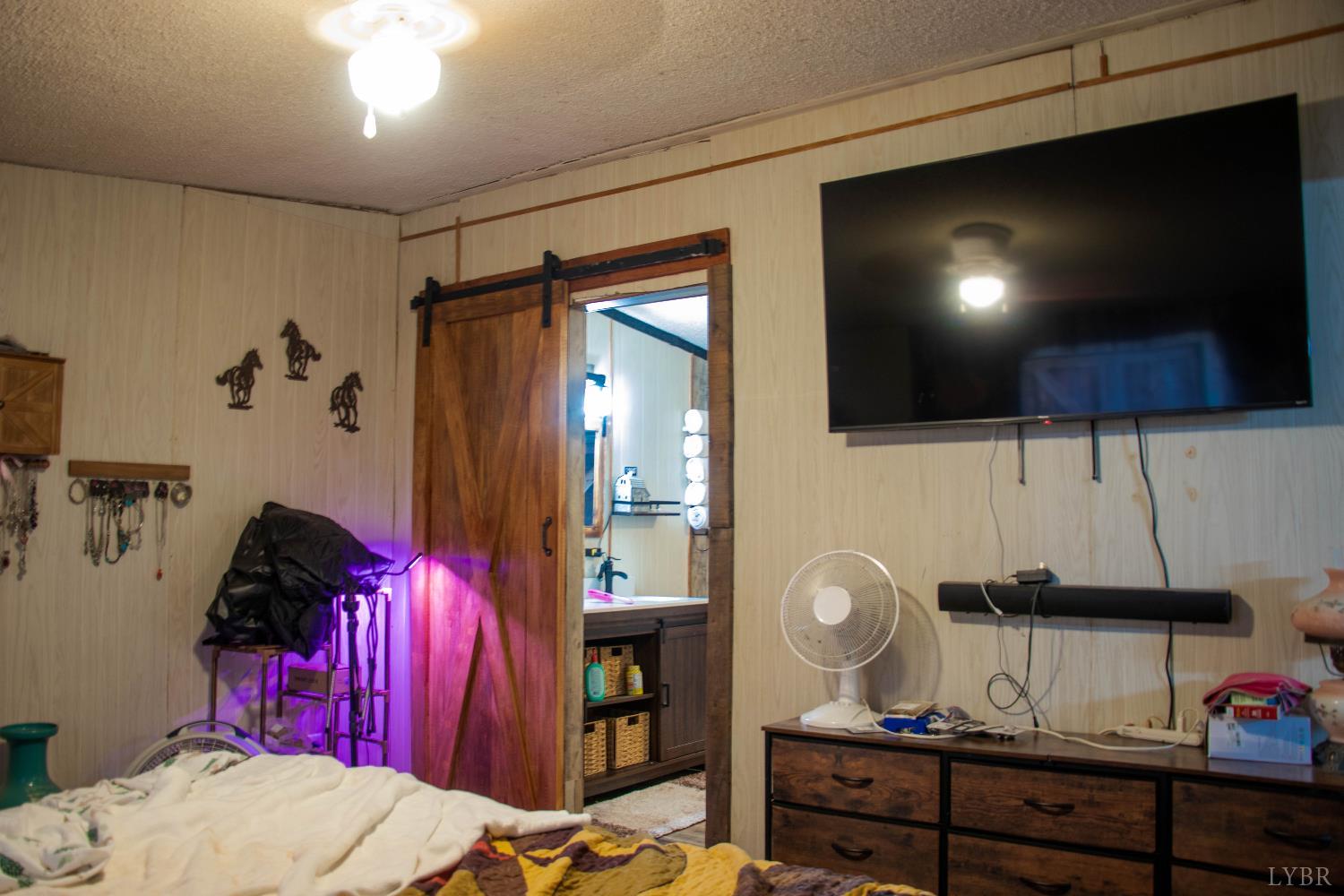 3156 Owens Mill Road Gretna, VA 24557 - Photo 15 of 31 a living room with furniture and a flat screen tv