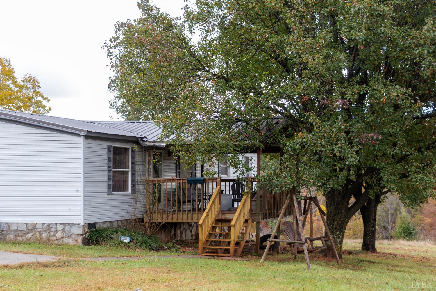 3156 Owens Mill Road Gretna, VA 24557 - Photo 28 of 31 a view of a backyard with a slide