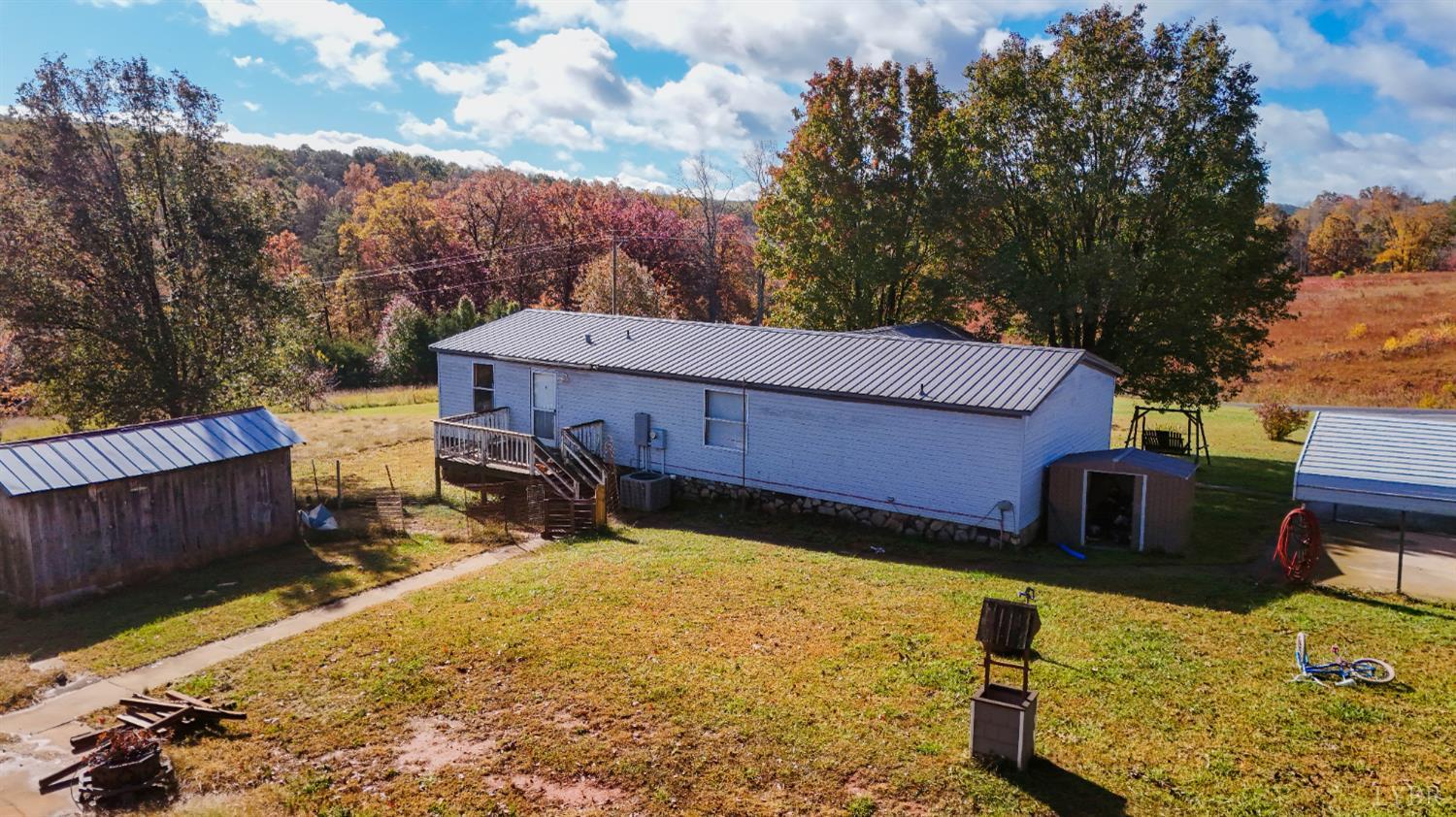 3156 Owens Mill Road Gretna, VA 24557 - Photo 3 of 31 a view of a house with wooden fence