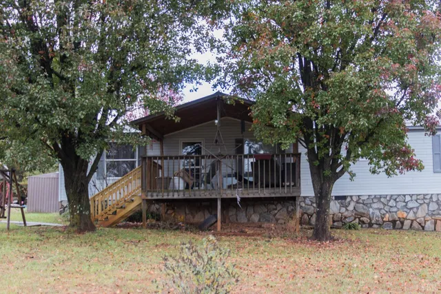 a kitchen with stainless steel appliances a stove refrigerator sink and microwave