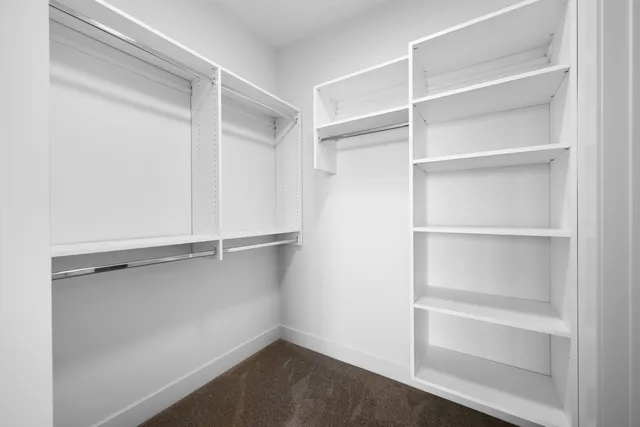 a view of an empty walk in closet
