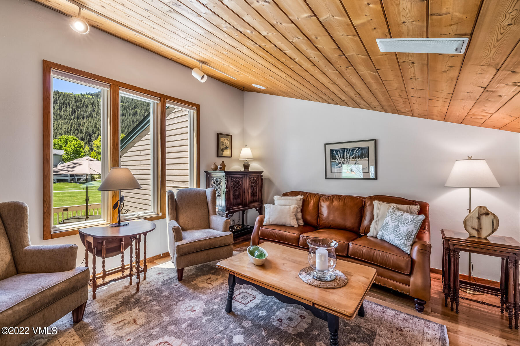 8 Deer Boulevard Eagle-Vail, CO 81620 - Photo 12 of 34 a living room with furniture a rug and a large window