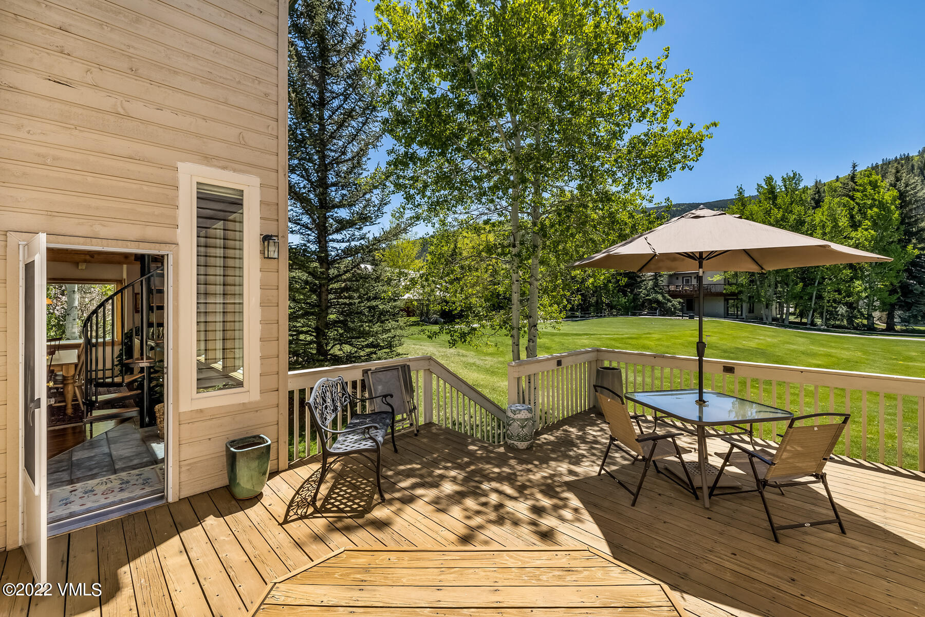 8 Deer Boulevard Eagle-Vail, CO 81620 - Photo 15 of 34 a view of a table and chairs on the deck