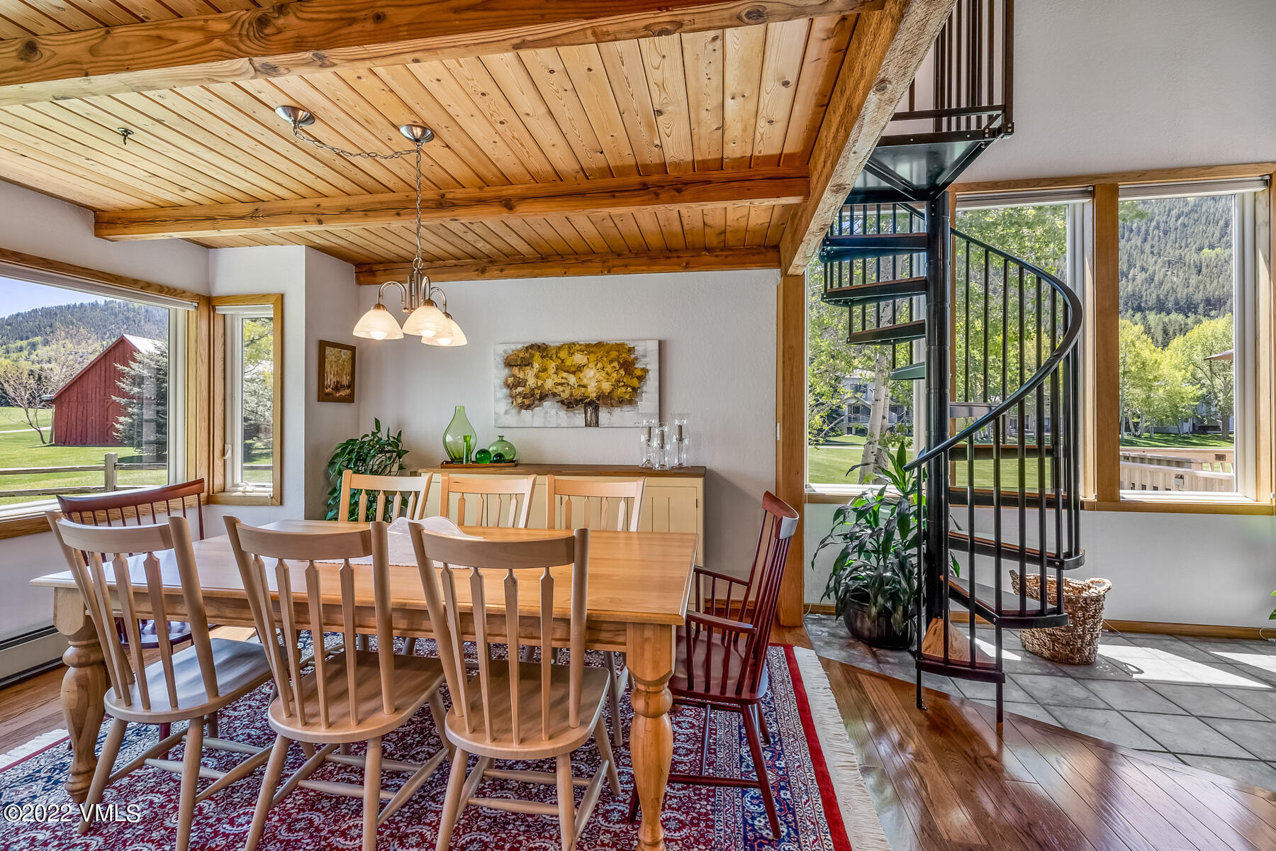 8 Deer Boulevard Eagle-Vail, CO 81620 - Photo 17 of 34 a view of a dining room with furniture window and wooden floor