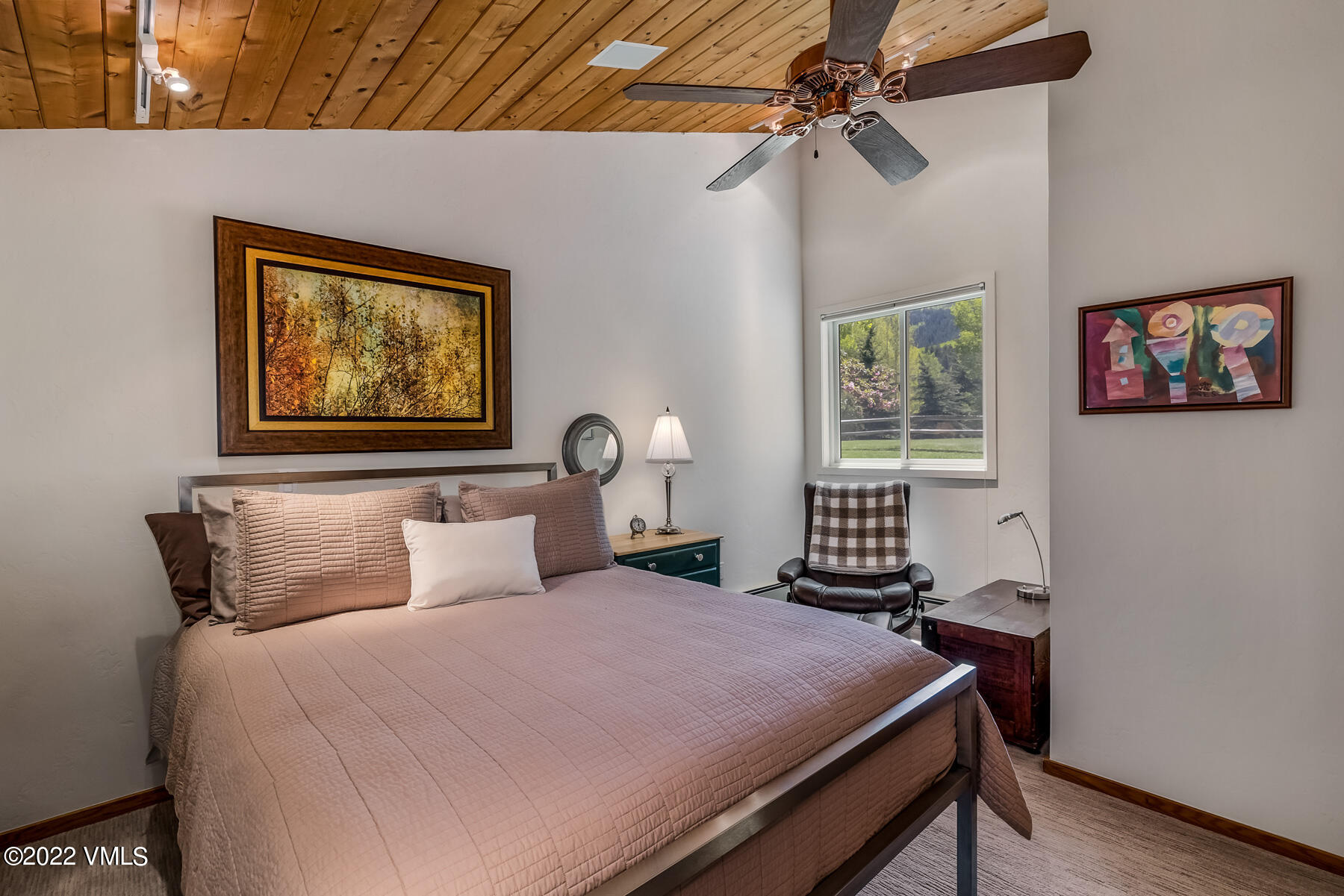 8 Deer Boulevard Eagle-Vail, CO 81620 - Photo 18 of 34 a bedroom with a bed and a painting on the wall