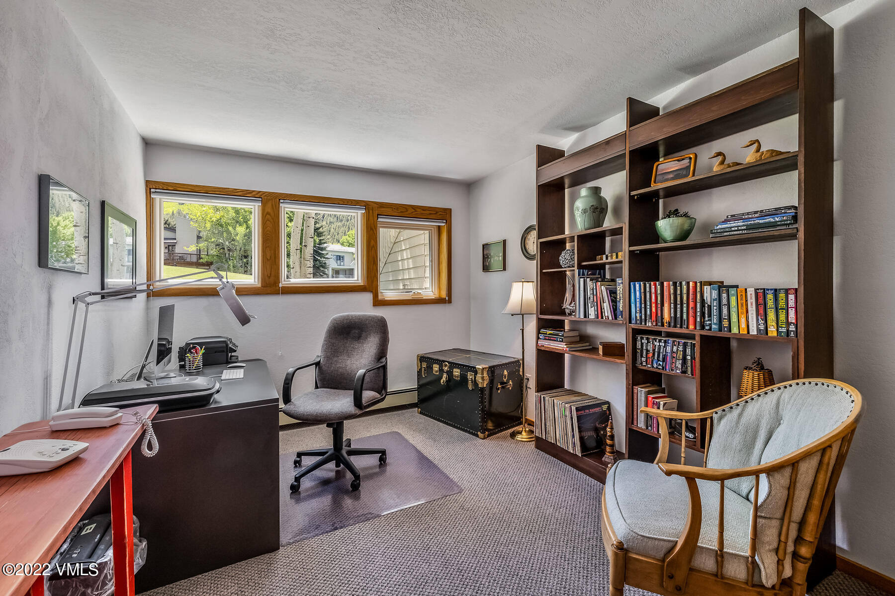 8 Deer Boulevard Eagle-Vail, CO 81620 - Photo 20 of 34 a view of a workspace with furniture and a bookshelf