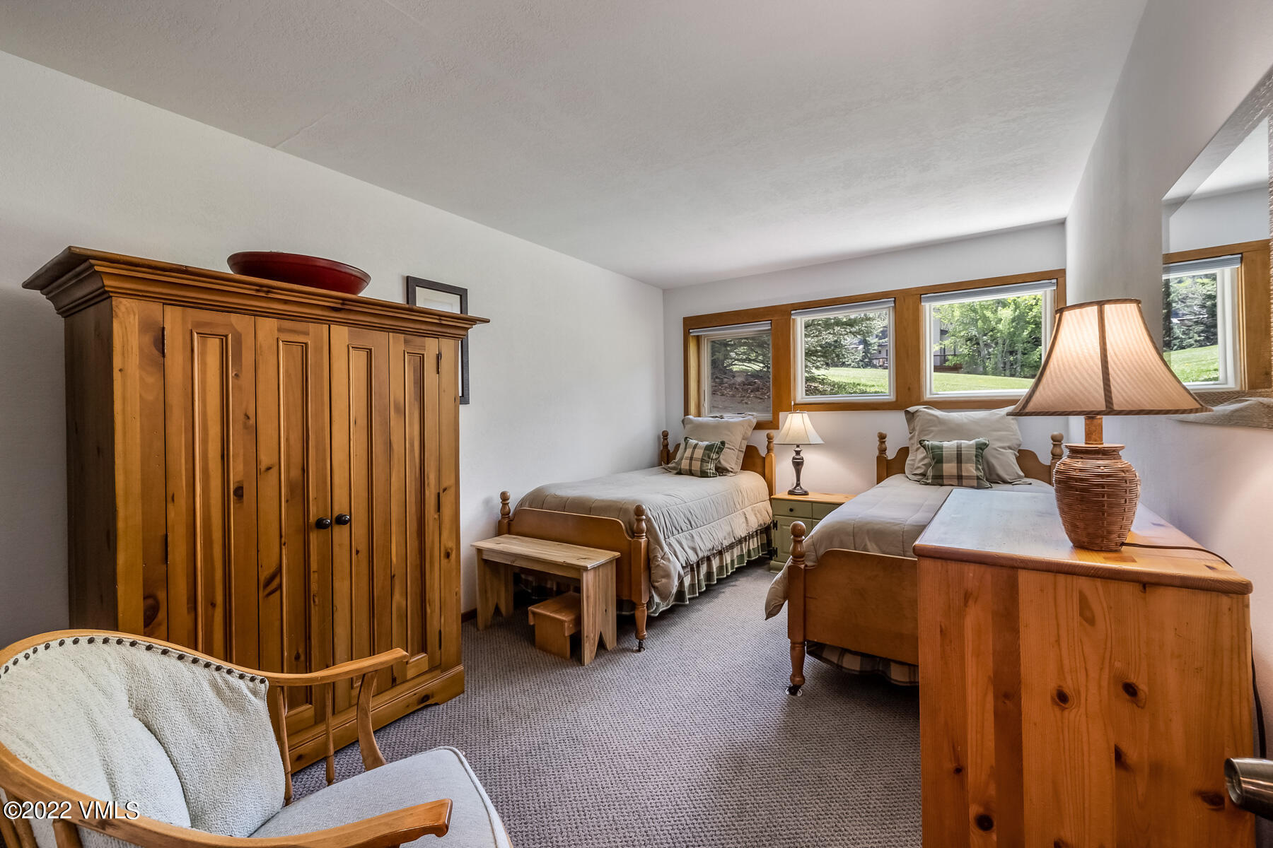 8 Deer Boulevard Eagle-Vail, CO 81620 - Photo 21 of 34 a bedroom with furniture and a window